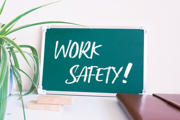 Work Safety text on blackboard
