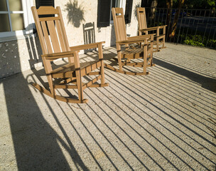 Empty rocking chairs on the front porch