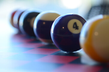 pool balls isolated on white chess board