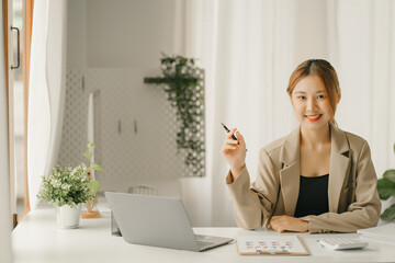 Businessmen are calculating income expenditure and analyzing real estate investment data,...