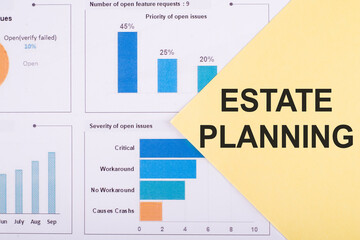 Business concept - Top view notebook writing ESTATE PLANNING