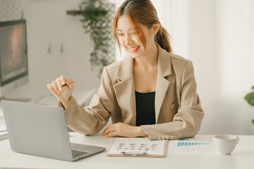 Businessmen are calculating income expenditure and analyzing real estate investment data, Accounting Financial and tax systems concept