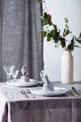 Home decor concept with linen tablecloth and linen napkin