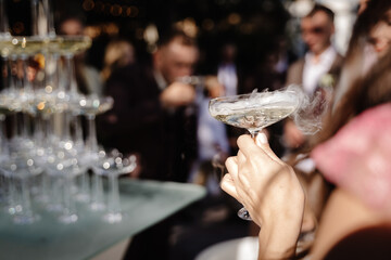 pyramid of champain set of empty wineglasses in restaurant bar