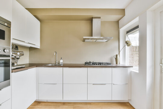 Modern Kitchen With White Cabinets