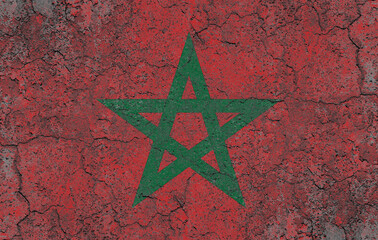 Morocco flag painted on a cracked old concrete wall surface