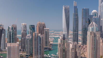 Skyscrapers of Dubai Marina near Sheikh Zayed Road with highest residential buildings timelapse