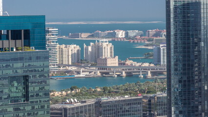 Fototapeta na wymiar Office buildings in Dubai Internet City and Media City district aerial timelapse