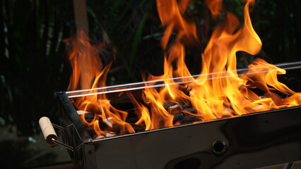 Empty Barbecue Flaming Grill Close Up With Bright Flames