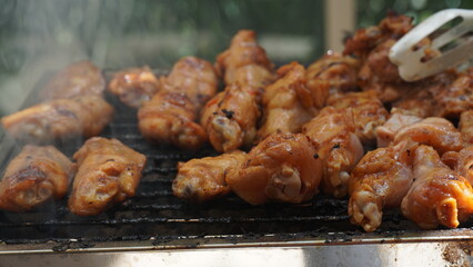 Fresh chicken steak grill meat on fire. Making barbecue on the grill