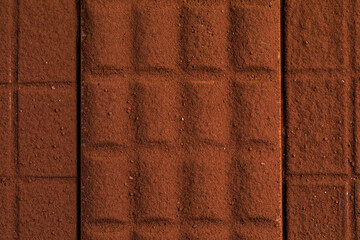 Fototapeta premium collection sweet chocolate blocks with powder, texture background