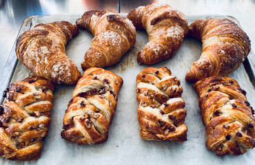 hot freshly baked croissants for breakfast close up photo