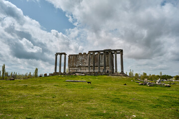 Fototapeta na wymiar Wide angle and low angle view of Zeus Temple in Turkey Cavdarli called as Temple of greek city Zeus