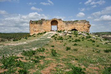 Fototapeta na wymiar The ruins at Blaundus, Turkey, Blaundus ancient greek city and its entrance gate. Low angle view.