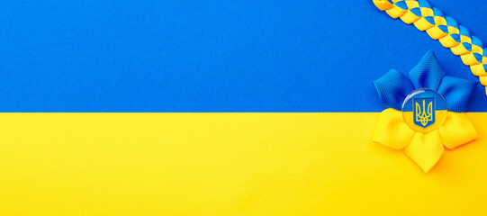 Blue yellow background. Ukrainian flower trident symbol isolated on yellow blue flag. Love Ukraine...
