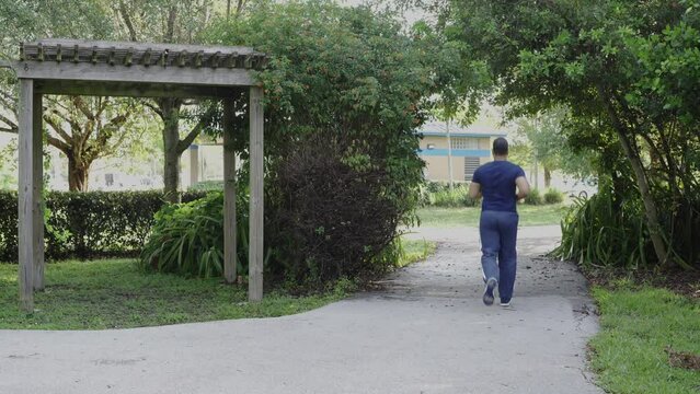 MAN RUNNING IN THE PARK