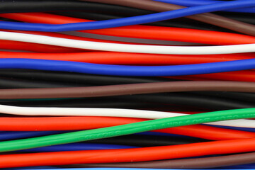 Copper mounting electrical wires in color insulation close-up. 