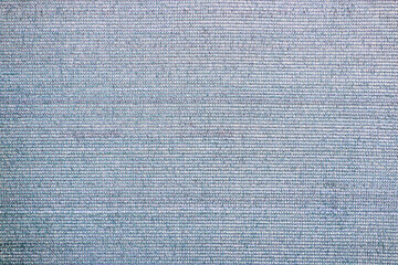 Fototapeta premium Surface made of coarse plastic textile fabric.