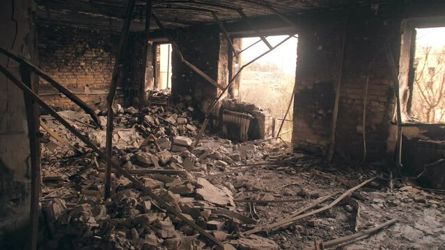 War damage house building cars people city civil rocket bomb Ukraine