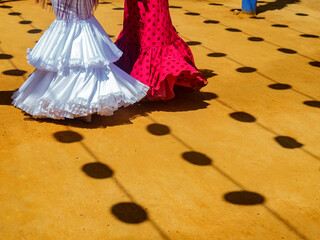 Obraz premium Trajes de flamenca en la feria de Abril / In the April fair Flamenco dresses. Sevilla