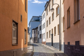 Fototapeta na wymiar A narrow alley downtown Cologne on a spring day