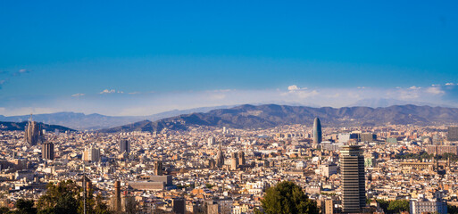 Panorama of the city of Barcelona Spain on a sunny day, seen from Montjuic.