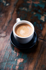  Cup of coffee on rustic wooden background. Copy space.