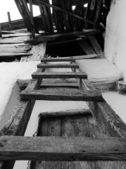 classic handmade wooden ladder for climbing on the roof,