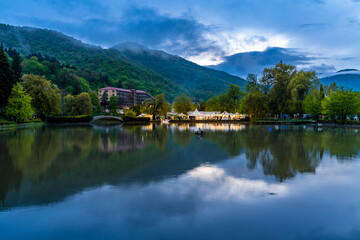 View of the beautiful  Dilijan's artificial lake on a late evening with mountains and sky reflection in the lake