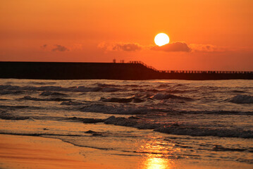 Sunset over the sea seen from the Uchinada coast in Ishikawa prefecture, Japan