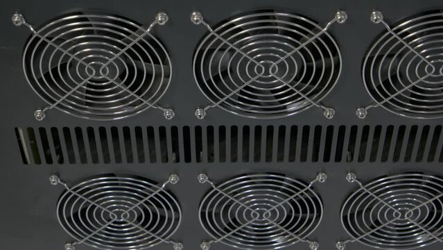 Close-up black panel of computer radiator coolers. Turned off machine fans.