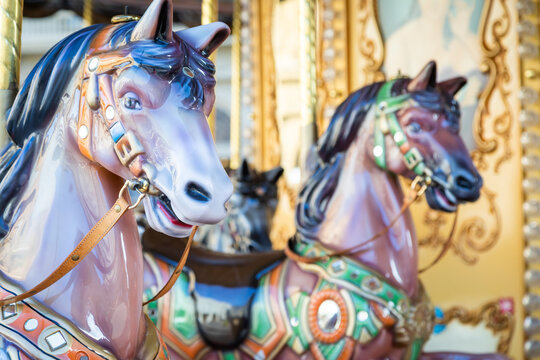 Florence, Italy - Circa March 2022: vintage carousel horse - antique attraction.