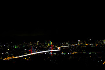 Istanbul night; bridge and city lights.