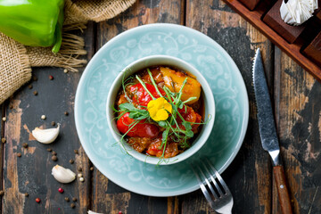 ajapsandali georgian kitchen on blue bowl on wooden table top view