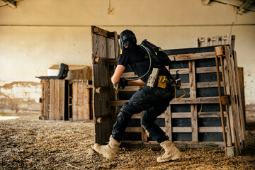 Airsoft soldier moving in combat during a game