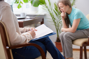 Female patient C talks about psychological problems to a psychologist.