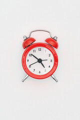 Retro Red alarm clock on white background