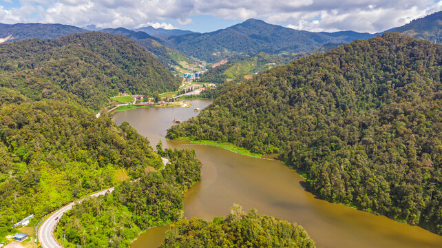 Aerial view over the Cameron Highlands, Malaysia from the sky. Aerial birds eye view over a artificial lake in the Malaysian Cameron highlands. Drone capture of the highland landscape with lake