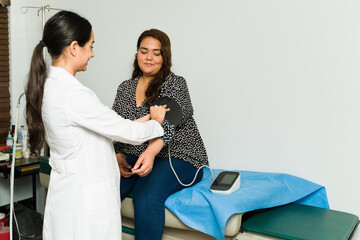 Obese woman getting a check-up - obrazy, fototapety, plakaty