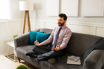 Fototapeta premium Relaxed businessman meditating