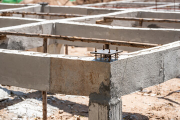 Steel base plate at fixed by j-bolt and steel bar in concrete,  Building and construction concept