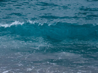 Fototapeta na wymiar Waves on the beach 4