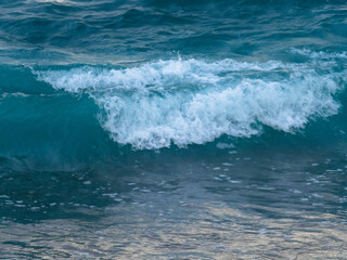 Fototapeta na wymiar Waves on the beach 2