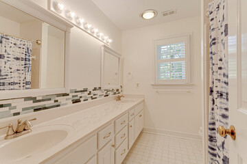 Interior bathroom double vanity backsplash tile long mirror