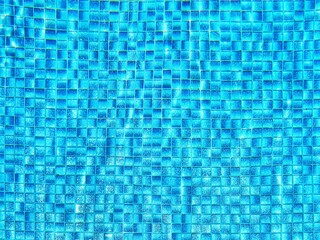 Overhead view of ripple surface water in blue swimming pool with many tiles at bootom.Swimming pool bottom caustics ripple and flow with waves background. Summer background. Texture of water surface.