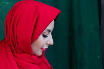 Modesty muslim girl in red scarf