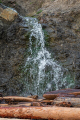 A small waterfall from the cliff face