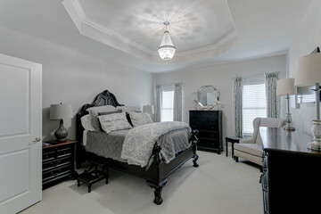 Gothic traditional black bed chandelier primary bedroom