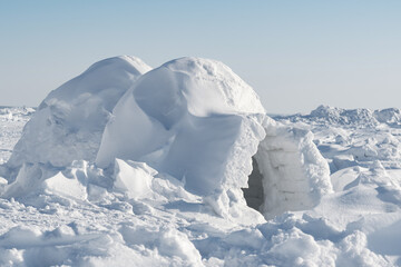 Real snow igloo house in the winter.	