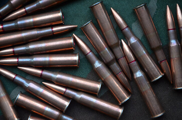 Ammunition 7,62x54 with camo background